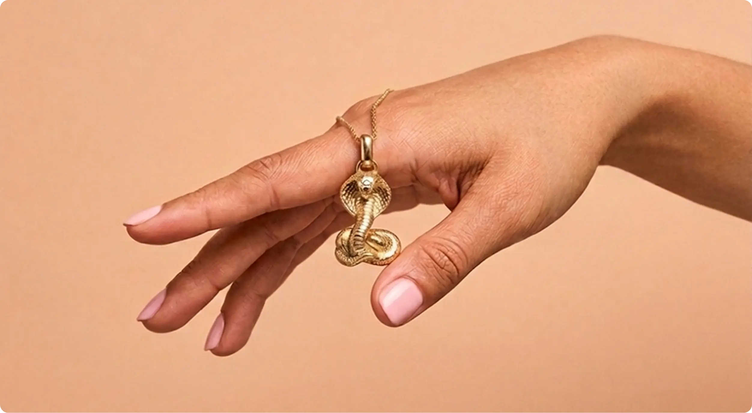Hand wearing an Emillie Anne gold ring